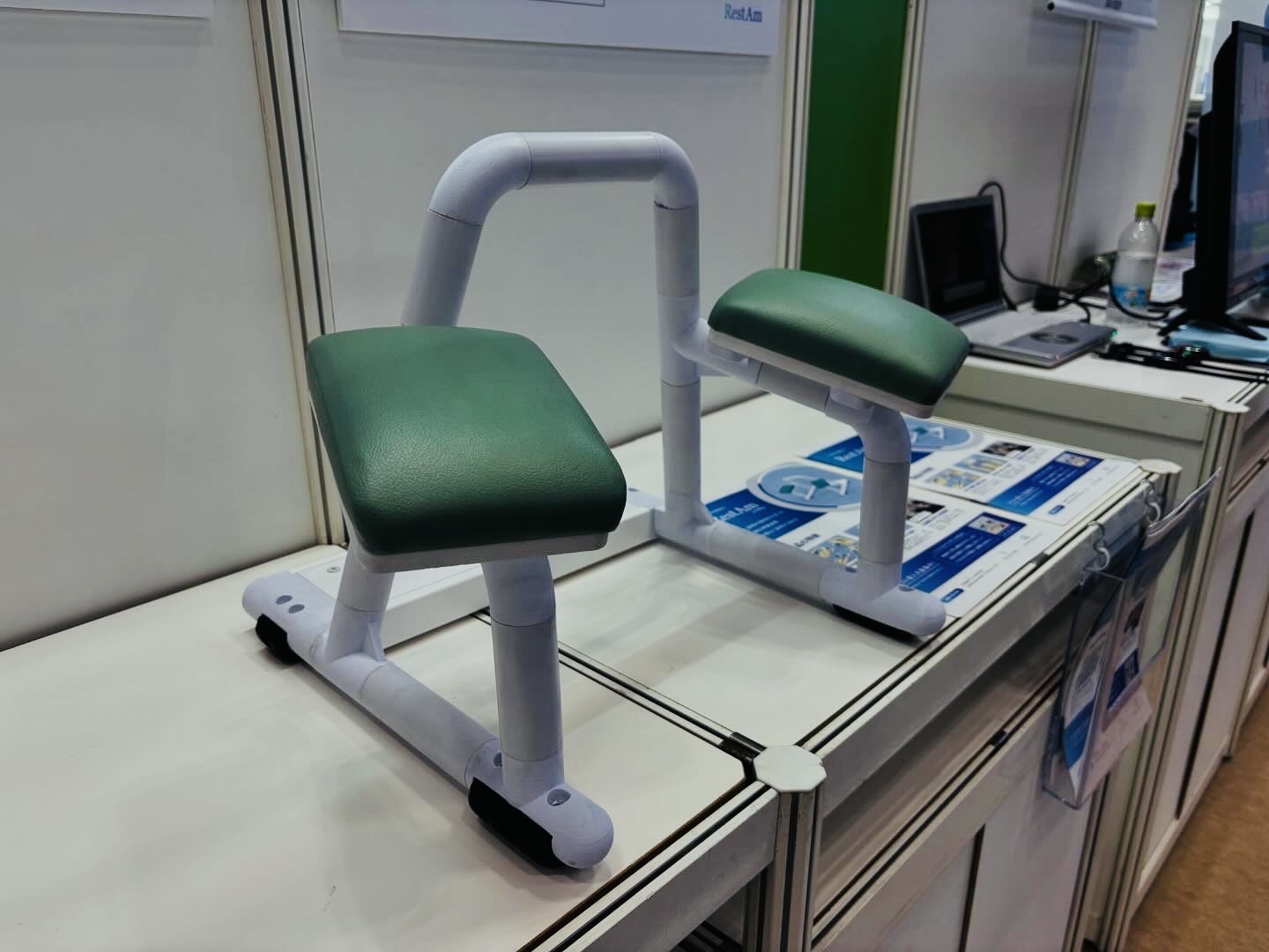 <div class='lum-box'><h4 class='fontColor_blue lum-font-size'>CT Arm Support Device (RestAm)</h4></div><div class='lum-font-cnt'>This product helps alleviate the burden on patients who must maintain an elevated arm position for approximately 15 minutes during CT imaging while receiving contrast agent injections. By doing so, it contributes to improving workflow efficiency and increasing turnover rates in medical facilities.</div>