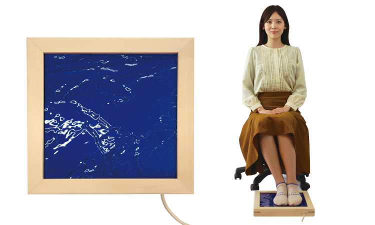 <div class='lum-box'><h4 class='fontColor_blue lum-font-size'>Foot Ganban MEGUMI Ai</h4></div>
        		<div class='lum-font-cnt'>Experience the warmth of Tamagawa Onsen's footbath at home. The Foot Ganban MEGUMI Ai, infused with Yunohana powder, negative ion powder, and far-infrared powder, gently warms your feet, spreading soothing warmth deep into your body. Providing comfortable thermal support all year round, it’s perfect for relaxation and cold relief. Enjoy a moment of pure comfort and relaxation.
</div>