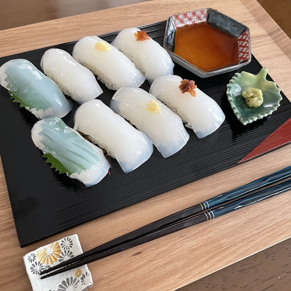 <div class='lum-box'><h4 class='fontColor_blue lum-font-size'>Karunaa Coco Up Seafood</h4></div>
        	 <div class='lum-font-cnt'>A squid sashimi–style product made primarily from nata de coco.

You can enjoy the unique texture and flavor that closely resemble squid sashimi.

It can be eaten as-is like sashimi, or placed on vinegared rice to make sushi!

It’s also delicious in seafood-style salads or served as a light, refreshing dressed dish.</div>