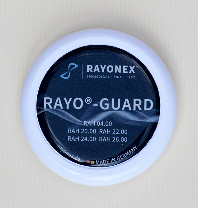 <div class='lum-box'><h4 class='fontColor_blue lum-font-size'>Rayo-Guard</h4></div>
        		<div class='lum-font-cnt'>You can carry it in your pocket or wear it around your neck. It reduces electromagnetic wave exposure, and bacteria, viruses, parasites, and fungi are repelled from your body.</div>